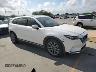 2021 Mazda CX-9 Grand Touring with VIN JM3TCADY2M0519977, listed as a Copart auction lot 76137724 with 31,306 mi miles and Salvage title. Bid and sale history available at DreamBid. Image 4.