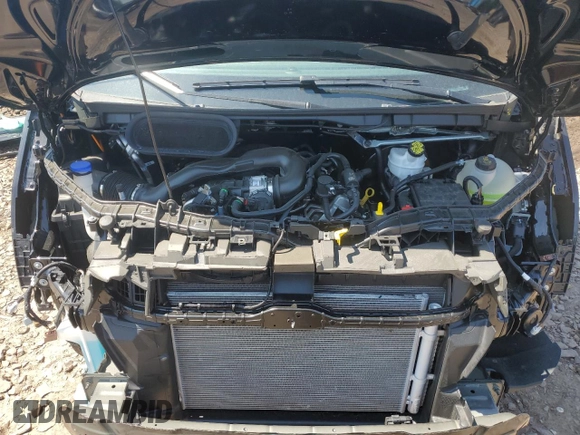 2024 Ford Transit Cargo z VIN 1FTBW3X81RKB79008, wystawiony jako Copart lot #58158005 z przebiegiem Nie podano mil oraz Szkoda całkowita • Salvage title. Historia ofert i sprzedaży dostępna na DreamBid. Obrazek 12.
