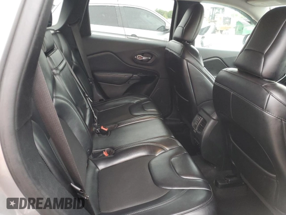 2019 Jeep Cherokee Altitude with VIN 1C4PJLLB3KD339082, listed as a Copart auction lot 54840275 with 197,069 mi miles and Salvage title. Bid and sale history available at DreamBid. Image 11.