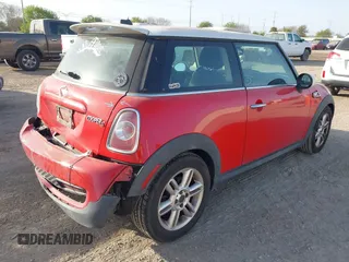 2013 MINI Hardtop S with VIN WMWSV3C56DT392499, listed as a IAAI auction lot 41855073 with 55,403 mi miles and . Bid and sale history available at DreamBid. Image 4.