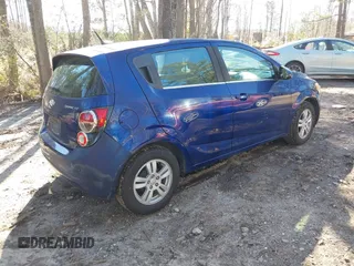 2014 Chevrolet Sonic LT with VIN 1G1JC6SG7E4118564, listed as a IAAI auction lot 41827748 with 120,326 mi miles. Bid and sale history available at carsss.com. Image 4.