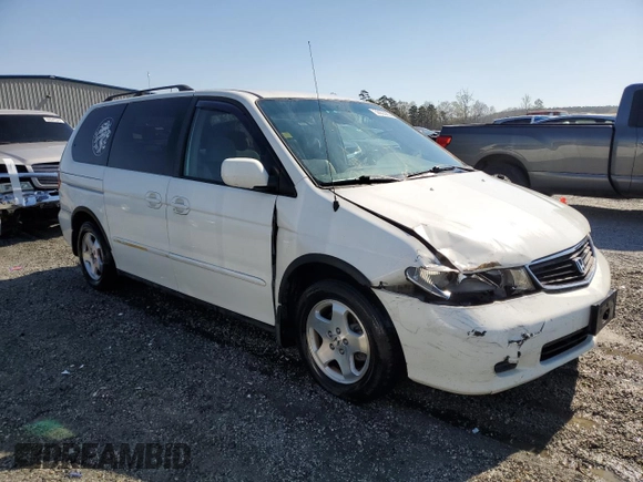 2000 Honda Odyssey EX with VIN 2HKRL1861YH564896, listed as a Copart auction lot 50635805 with 156,313 mi miles and Salvage Title. Bid and sale history available at DreamBid. Image 4.
