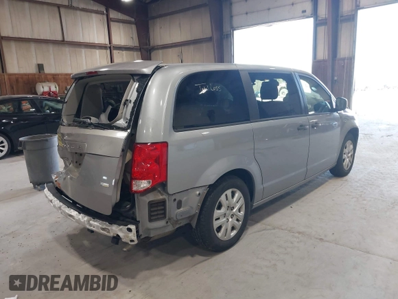 2019 Dodge Grand Caravan SE with VIN 2C4RDGBG3KR571537, listed as a IAAI auction lot 42036875 with 95,190 mi miles and . Bid and sale history available at DreamBid. Image 4.