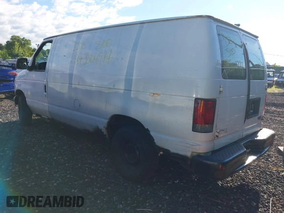 2002 Ford Econoline Cargo with VIN 1FTRE142X2HA95262, listed as a IAAI auction lot 39771693 with 204,642 mi miles. Bid and sale history available at carsss.com. Image 3.