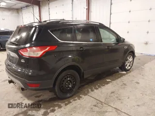 2013 Ford Escape SEL with VIN 1FMCU9H96DUC64584, listed as a IAAI auction lot 41357053 with 139,422 mi miles. Bid and sale history available at carsss.com. Image 4.