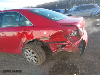 2007 Toyota Camry CE with VIN 4T1BE46K67U010279, listed as a IAAI auction lot 41504065 with 297,916 mi miles. Bid and sale history available at carsss.com. Image 6.