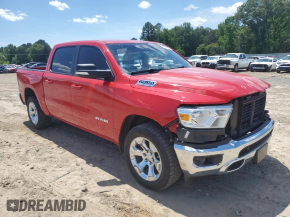 2021 Ram 1500 Lone Star with VIN 1C6RREFTXMN630958, listed as a Copart auction lot 55039995 with 53,497 mi miles and Salvage title. Bid and sale history available at DreamBid. Image 4.