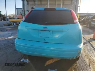 2000 Ford Focus ZX3 with VIN 3FAHP3131YR213601, listed as a Copart auction lot 88597525 with 134,724 mi miles and Salvage title. Bid and sale history available at DreamBid. Image 6.