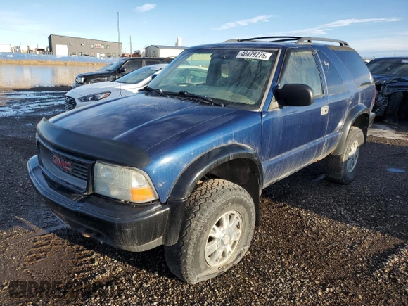 2003 GMC Jimmy z VIN 1GKCT18X13K112296, wystawiony jako Copart lot #46479275 z przebiegiem Nie podano mil oraz Czysty tytuł • Clean title. Historia ofert i sprzedaży dostępna na DreamBid. Obrazek 2.