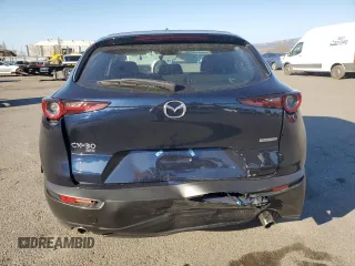 2025 Mazda CX-30 S with VIN 3MVDMBAM5SM751984, listed as a Copart auction lot 43232255 with 2,448 mi miles and Salvage title. Bid and sale history available at DreamBid. Image 6.