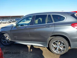 2017 BMW X1 sDrive28i with VIN WBXHU7C30H5H32753, listed as a IAAI auction lot 41441791 with 100,072 mi miles. Bid and sale history available at carsss.com. Image 15.