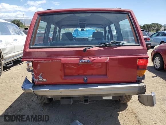 1992 Jeep Cherokee with VIN 1J4FJ58S0NL140995, listed as a Copart auction lot 56705875 with 253,657 mi miles and Salvage title. Bid and sale history available at DreamBid. Image 6.