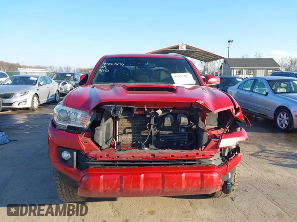2018 Toyota Tacoma SR with VIN 3TMCZ5ANXJM154305, listed as a IAAI auction lot 41557497 with 182,624 mi miles and . Bid and sale history available at DreamBid. Image 12.