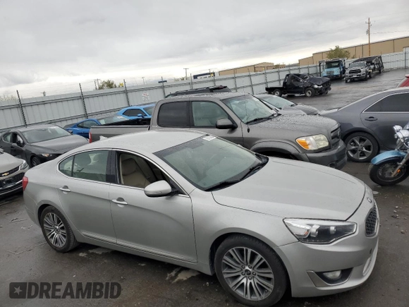 2014 Kia Cadenza Premium with VIN KNALN4D77E5130328, listed as a Copart auction lot 78710404 with 124,364 mi miles and Salvage Title. Bid and sale history available at carsss.com. Image 4.