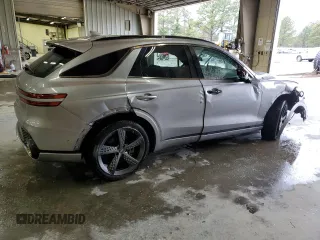 2022 Genesis GV70 Sport with VIN KMUMCDTC3NU012338, listed as a Copart auction lot 42691625 with 67,161 mi miles and Salvage title. Bid and sale history available at DreamBid. Image 3.