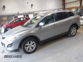 2011 Mazda CX-9 Touring with VIN JM3TB3CV2B0331219, listed as a IAAI auction lot 42408797 with 115,377 mi miles and . Bid and sale history available at DreamBid. Image 2.