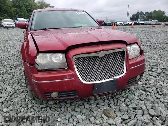 2009 Chrysler 300 Touring with VIN 2C3KA53V99H617274, listed as a Copart auction lot 71791144 with 123,045 mi miles and Salvage Title. Bid and sale history available at carsss.com. Image 10.