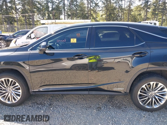 2022 Lexus RX 450h with VIN 2T2JGMDA4NC076274, listed as a IAAI auction lot 42075301 with 32,410 mi miles and . Bid and sale history available at DreamBid. Image 14.