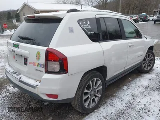 2015 Jeep Compass Limited with VIN 1C4NJDCB9FD216387, listed as a IAAI auction lot 41231484 with 95,436 mi miles. Bid and sale history available at carsss.com. Image 4.