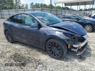 2022 Tesla Model Y Performance with VIN 7SAYGDEF3NF532311, listed as a Copart auction lot 62997535 with 60,530 mi miles and Salvage title. Bid and sale history available at DreamBid. Image 4.