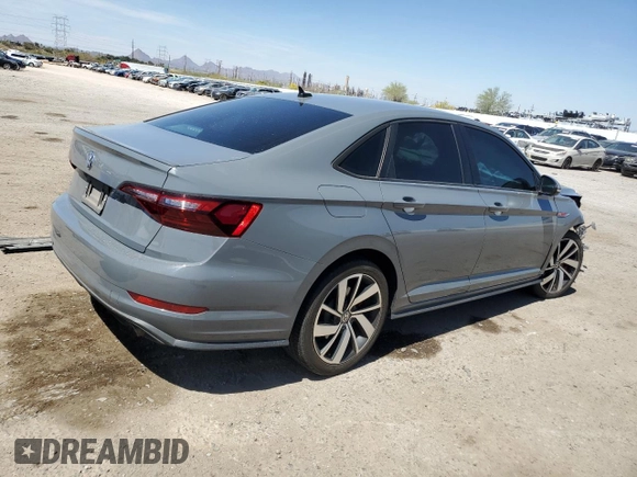 2021 Volkswagen Jetta GLI S с VIN 3VW6T7BUXMM001408, выставлен на аукционе Copart как лот 50454605 с пробегом 73 434 миль миль и Списание • Salvage title. История ставок и продаж доступна на DreamBid. Изображение 3.