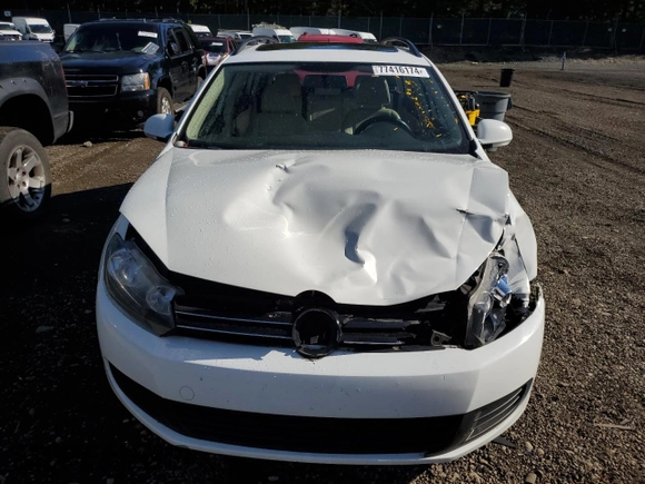 2014 Volkswagen Jetta SportWagen TDI w/Sunroof & Nav with VIN 3VWPL7AJ1EM614546, listed as a Copart auction lot 77416174 with 149,893 mi miles and Salvage Title. Bid and sale history available at carsss.com. Image 5.