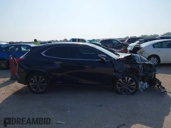 2022 Lexus UX 250h F Sport with VIN JTHR9JBHXN2058276, listed as a IAAI auction lot 42320129 with 83,439 mi miles and . Bid and sale history available at DreamBid. Image 13.