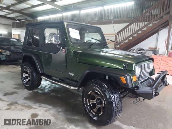 1998 Jeep Wrangler SE with VIN 1J4FY29P2WP733255, listed as a IAAI auction lot 41554602 with 157,316 mi miles. Bid and sale history available at carsss.com. Image 13.