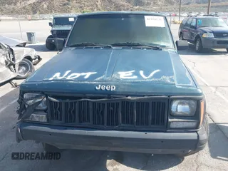 1996 Jeep Cherokee SE with VIN 1J4FT27P4TL309029, listed as a IAAI auction lot 42476830 with Not provided miles and . Bid and sale history available at DreamBid. Image 11.