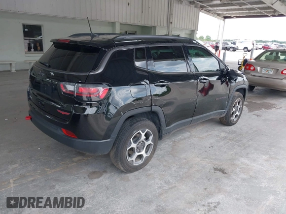 2022 Jeep Compass Trailhawk with VIN 3C4NJDDB5NT164201, listed as a IAAI auction lot 42214973 with 92,668 mi miles and . Bid and sale history available at DreamBid. Image 4.
