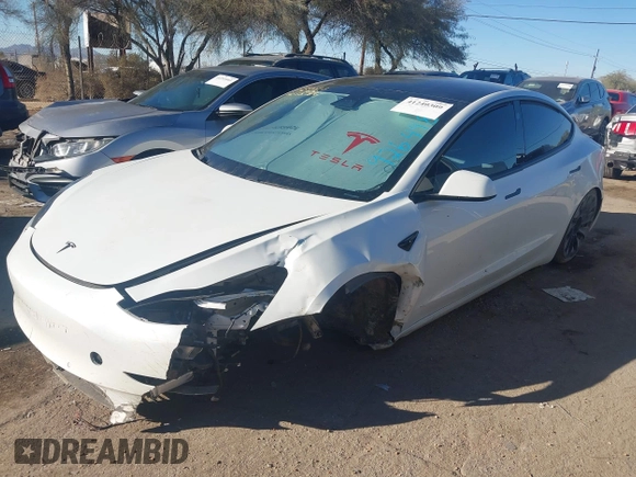 2021 Tesla Model 3 Performance with VIN 5YJ3E1EC6MF926448, listed as a IAAI auction lot 41240309 with 39,386 mi miles and . Bid and sale history available at DreamBid. Image 6.
