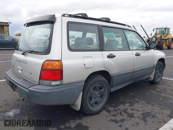 2000 Subaru Forester L with VIN JF1SF6353YH701667, listed as a IAAI auction lot 41499844 with 203,050 mi miles. Bid and sale history available at carsss.com. Image 4.