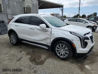 2023 Cadillac XT4 FWD Premium Luxury with VIN 1GYFZCR41PF111214, listed as a Copart auction lot 53532575 with 13,340 mi miles and Salvage Title. Bid and sale history available at carsss.com. Image 4.
