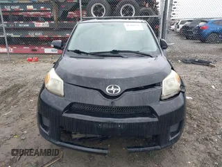 2010 Scion xD with VIN JTKKU4B45AJ058839, listed as a IAAI auction lot 41708936 with 214,685 mi miles. Bid and sale history available at carsss.com. Image 12.