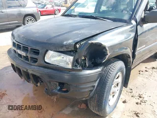 2001 Isuzu Rodeo S with VIN 4S2CK58W114363340, listed as a IAAI auction lot 41498698 with 185,408 mi miles and . Bid and sale history available at DreamBid. Image 6.