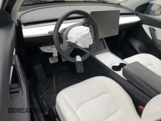 2022 Tesla Model Y Long Range z VIN 7SAYGDEE6NF318808, wystawiony jako Copart lot #57219915 z przebiegiem Nie podano mil oraz Szkoda całkowita • Salvage title. Historia ofert i sprzedaży dostępna na DreamBid. Obrazek 8.