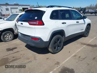 2016 Jeep Cherokee Sport with VIN 1C4PJMAB1GW314251, listed as a IAAI auction lot 41815330 with 124,588 mi miles. Bid and sale history available at carsss.com. Image 4.