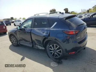 2018 Mazda CX-5 Touring with VIN JM3KFACM6J1323449, listed as a Copart auction lot 54090445 with 93,748 mi miles and Salvage Title. Bid and sale history available at carsss.com. Image 2.