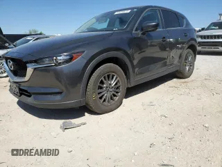 2017 Mazda CX-5 Touring with VIN JM3KFACL1H0100436, listed as a Copart auction lot 53058875 with 77,205 mi miles and Salvage Title. Bid and sale history available at DreamBid. Image 1.