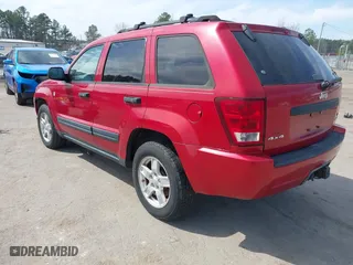 2005 Jeep Grand Cherokee Laredo with VIN 1J8HR48N55C556383, listed as a IAAI auction lot 41814624 with 189,102 mi miles. Bid and sale history available at carsss.com. Image 3.