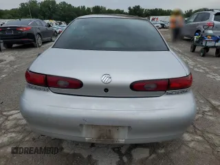 1997 Mercury Sable GS z VIN 1MELM50U4VG609283, wystawiony jako Copart lot #66853354 z przebiegiem Nie podano mil oraz Szkody całkowita. Historia ofert i sprzedaży dostępna na DreamBid. Obrazek 6.