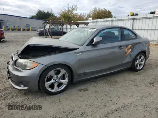2012 BMW 1 Series 128i with VIN WBAUP9C57CVL91337, listed as a Copart auction lot 76144404 with 87,093 mi miles and Salvage title. Bid and sale history available at DreamBid. Image 1.