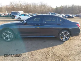 2017 BMW 7 Series 750i with VIN WBA7F0C34HGM21805, listed as a IAAI auction lot 41446797 with 88,753 mi miles and . Bid and sale history available at DreamBid. Image 14.