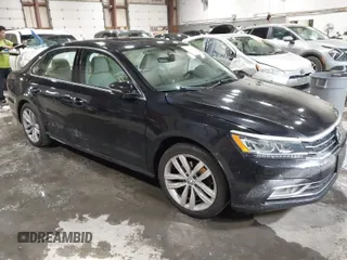 2018 Volkswagen Passat 2.0T SE with VIN 1VWBA7A33JC041338, listed as a IAAI auction lot 41620476 with 40,976 mi miles. Bid and sale history available at carsss.com. Image 1.