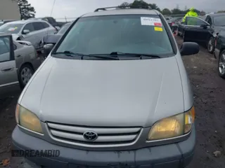 2003 Toyota Sienna CE with VIN 4T3ZF19C93U551570, listed as a IAAI auction lot 40961703 with 285,644 mi miles. Bid and sale history available at carsss.com. Image 12.