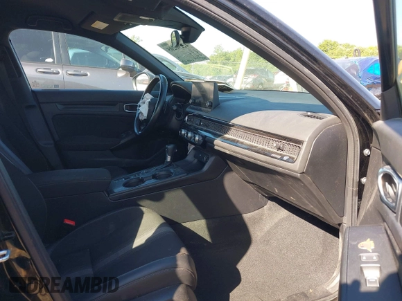 2023 Honda Civic Sport with VIN 2HGFE2F56PH509382, listed as a IAAI auction lot 42296205 with 125,584 mi miles and . Bid and sale history available at DreamBid. Image 5.