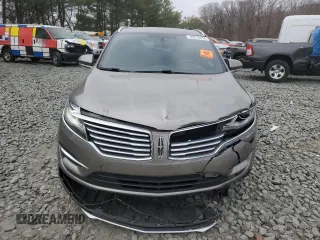 2016 Lincoln MKC Premier with VIN 5LMCJ1D91GUJ11628, listed as a Copart auction lot 49272455 with 143,726 mi miles and Salvage Title. Bid and sale history available at DreamBid. Image 5.