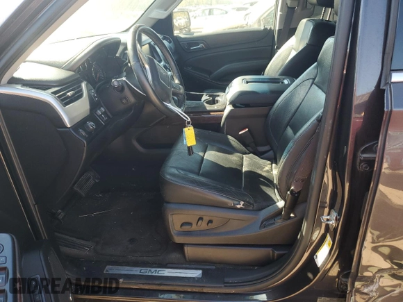 2015 GMC Yukon SLT with VIN 1GKS1BKC0FR239629, listed as a Copart auction lot 77414814 with 171,611 mi miles and Salvage Title. Bid and sale history available at carsss.com. Image 7.