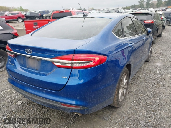 2017 Ford Fusion SE z VIN 3FA6P0H77HR309263, wystawiony jako IAAI lot #41914769 z przebiegiem 136 833 mil mil oraz . Historia ofert i sprzedaży dostępna na DreamBid. Obrazek 4.