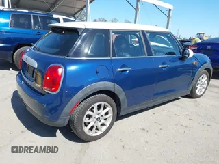 2015 MINI Hardtop 4 Door with VIN WMWXS5C50FT832438, listed as a IAAI auction lot 42632469 with 96,432 mi miles and . Bid and sale history available at DreamBid. Image 4.